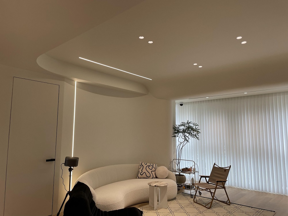 Minimalist round recessed spotlights installed in ceiling for modern residential lighting