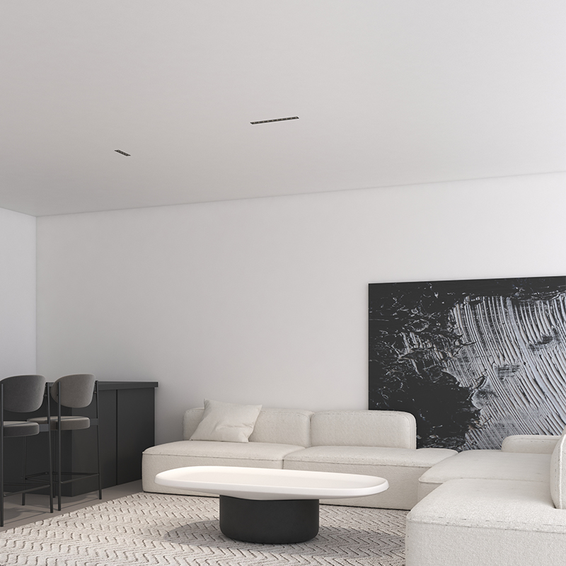 Recessed grille ceiling light with anti-glare optics for comfortable illumination in luxury homes and hospitality spaces