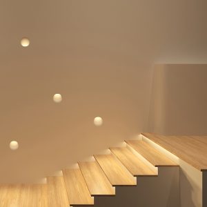 Plaster wall light with trimless finish for corridor and staircase applications, creating elegant ambient architectural wall lighting