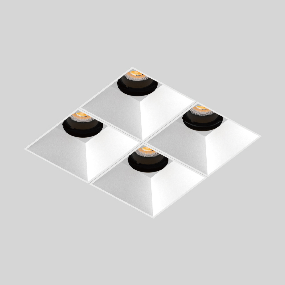 Frameless quad spotlight ceiling light for high end retail stores, designer showrooms and hospitality interiors