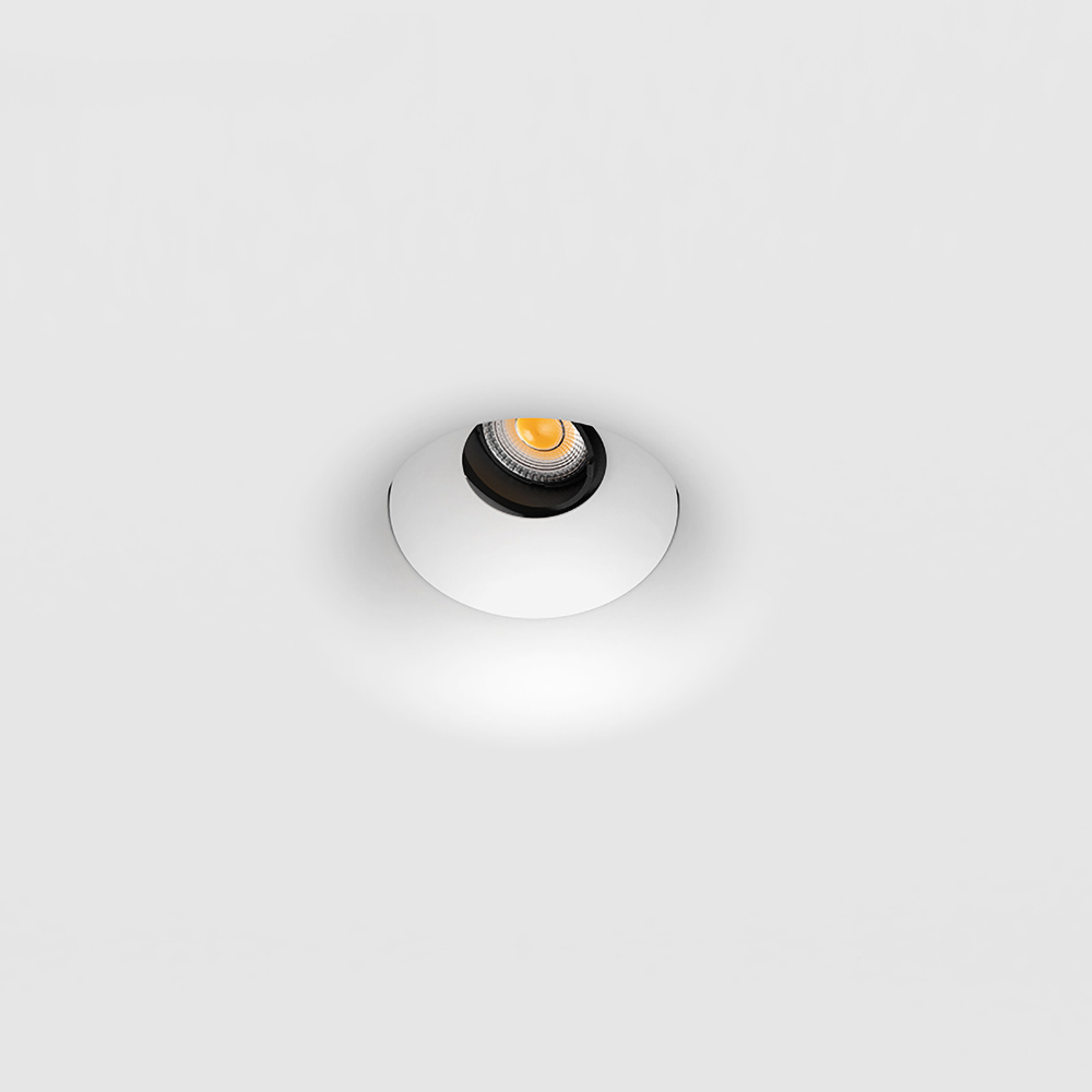 Trimless recessed plaster spotlight for luxury living rooms, delivering clean ceiling lines and precise accent lighting