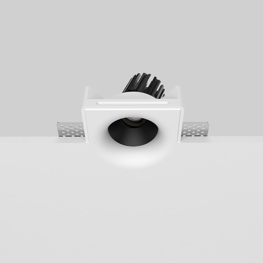 Recessed gypsum spotlight with seamless plaster-in installation, ideal for modern residential and commercial interiors