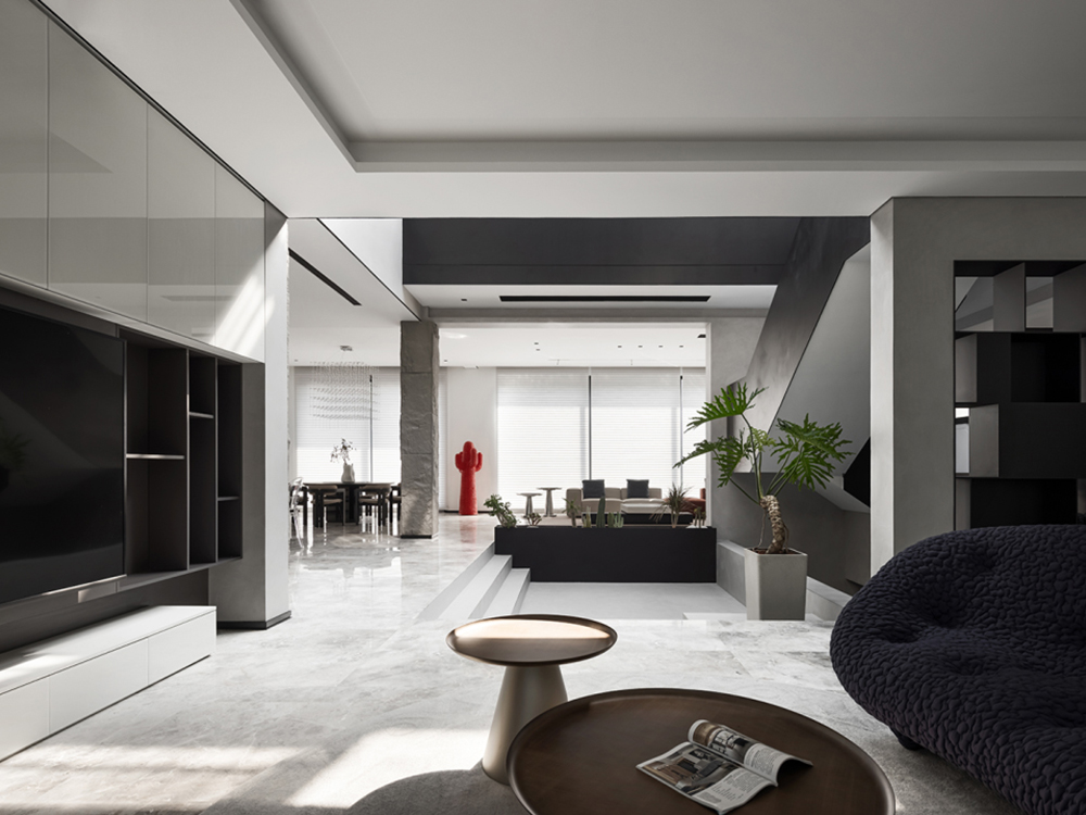 Modern home lighting design with recessed spotlights, pendant lights and layered ambient lighting